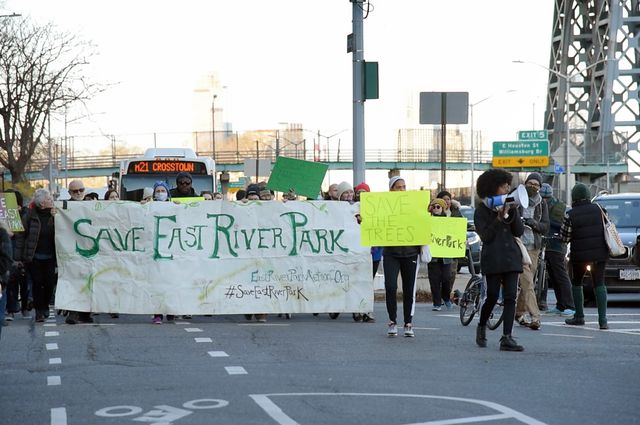 Protestors from East River Park Action lead a march along FDR Drive, during the demolition.